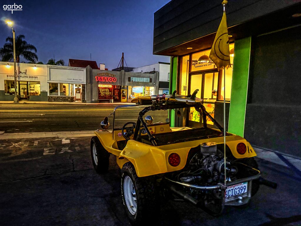 dune buggy before tattoo parlor