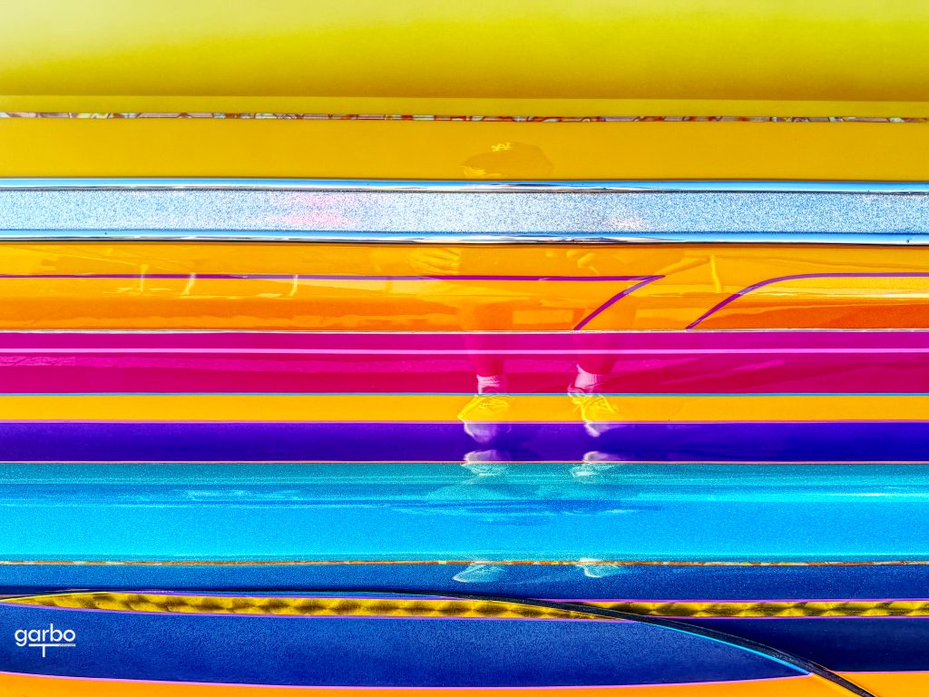 shoes reflected in car paint
